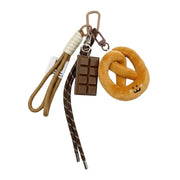 PRETZEL PLUSH WITH CHOCOLATE ACCENT CHARM