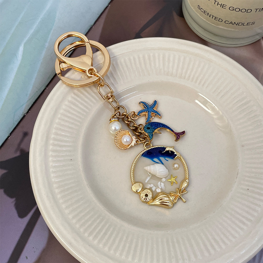 DOLPHIN SHELL STARFISH CHARM