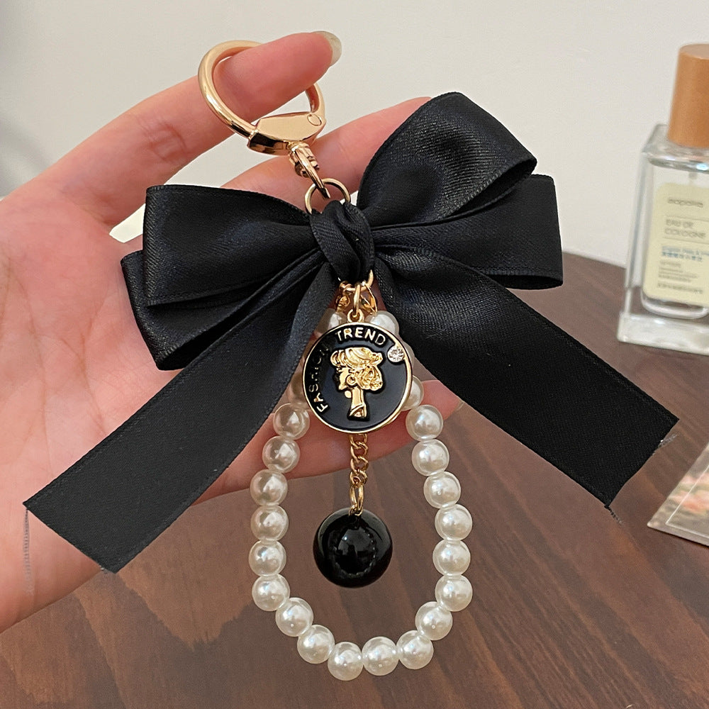 BOW TIE PEARL CHARM