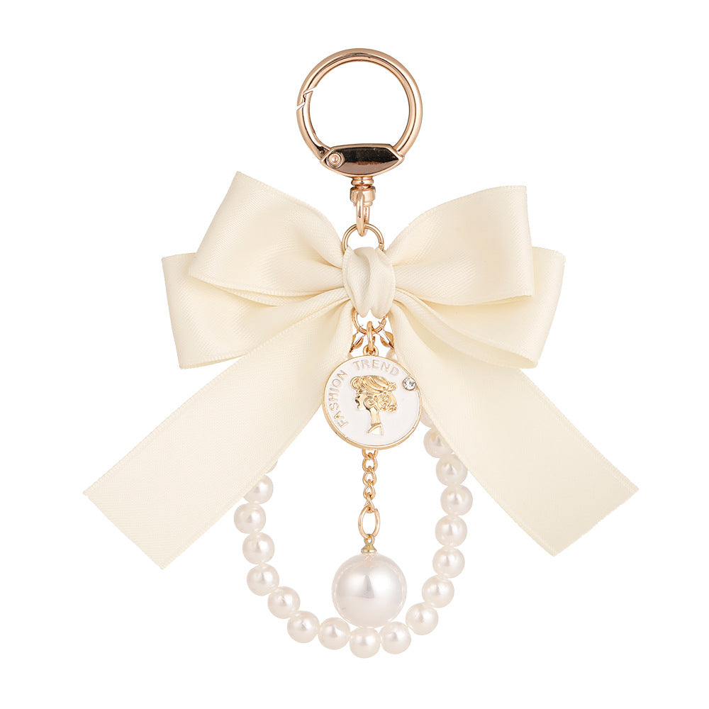 BOW TIE PEARL CHARM